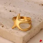 Bague Travesti Etoile Sculpte Or Acier Reglable - galerie