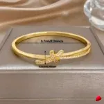 Bracelet Travesti Jonc Torsade Noeud Or Strass Plaque — galerie
