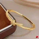 Bracelet Travesti Jonc Torsade Noeud Or Strass Plaque — galerie